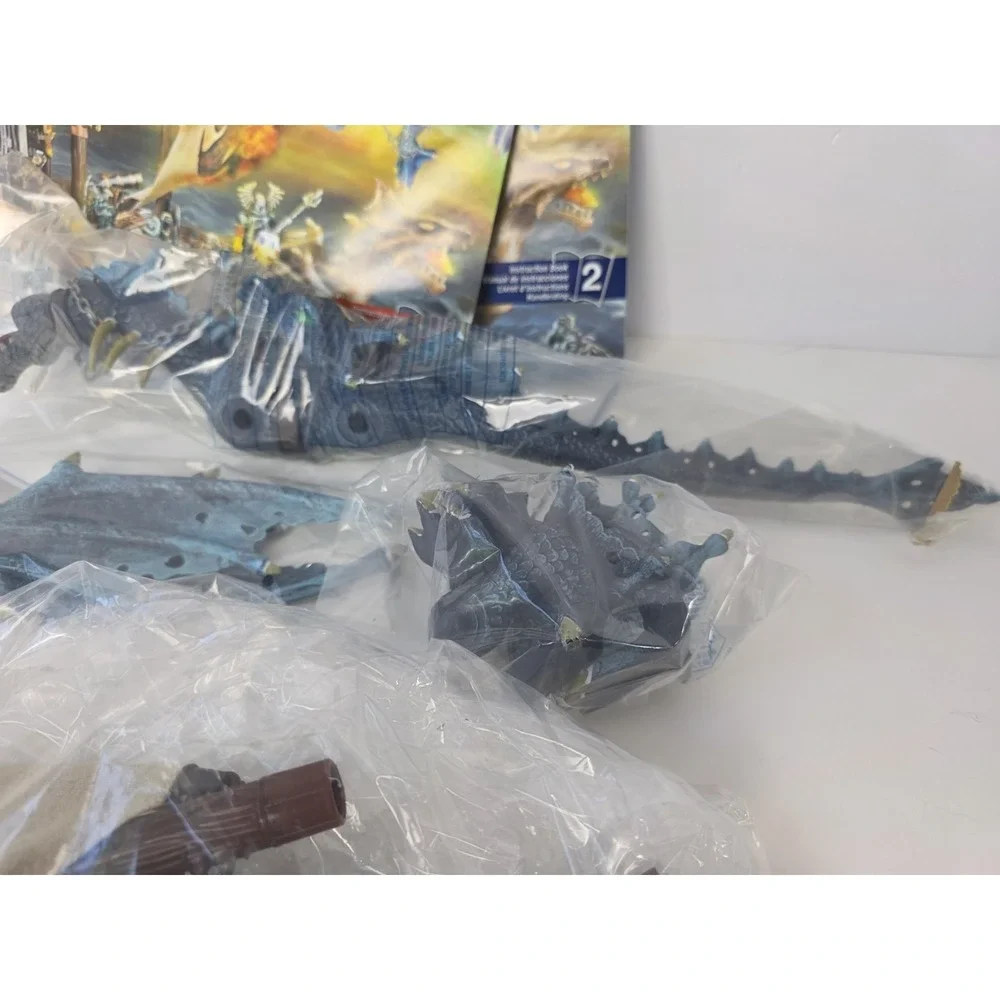 Large Mega Bloks lot Dragons Man o War pieces + challenge game pieces manuals